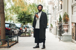 JJJJJerome Ellis standing in the middle of a city sidewalk