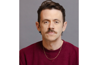 Portrait photography of a man wearing a red shirt