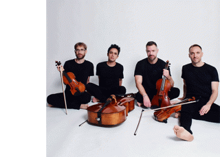 JACK Quartet seated. All wearing black on a white background.