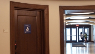 Door with signage and hallway in The Underground