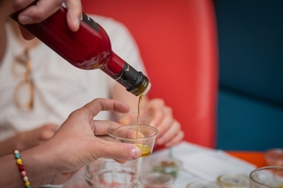 Olive oil being poured. 